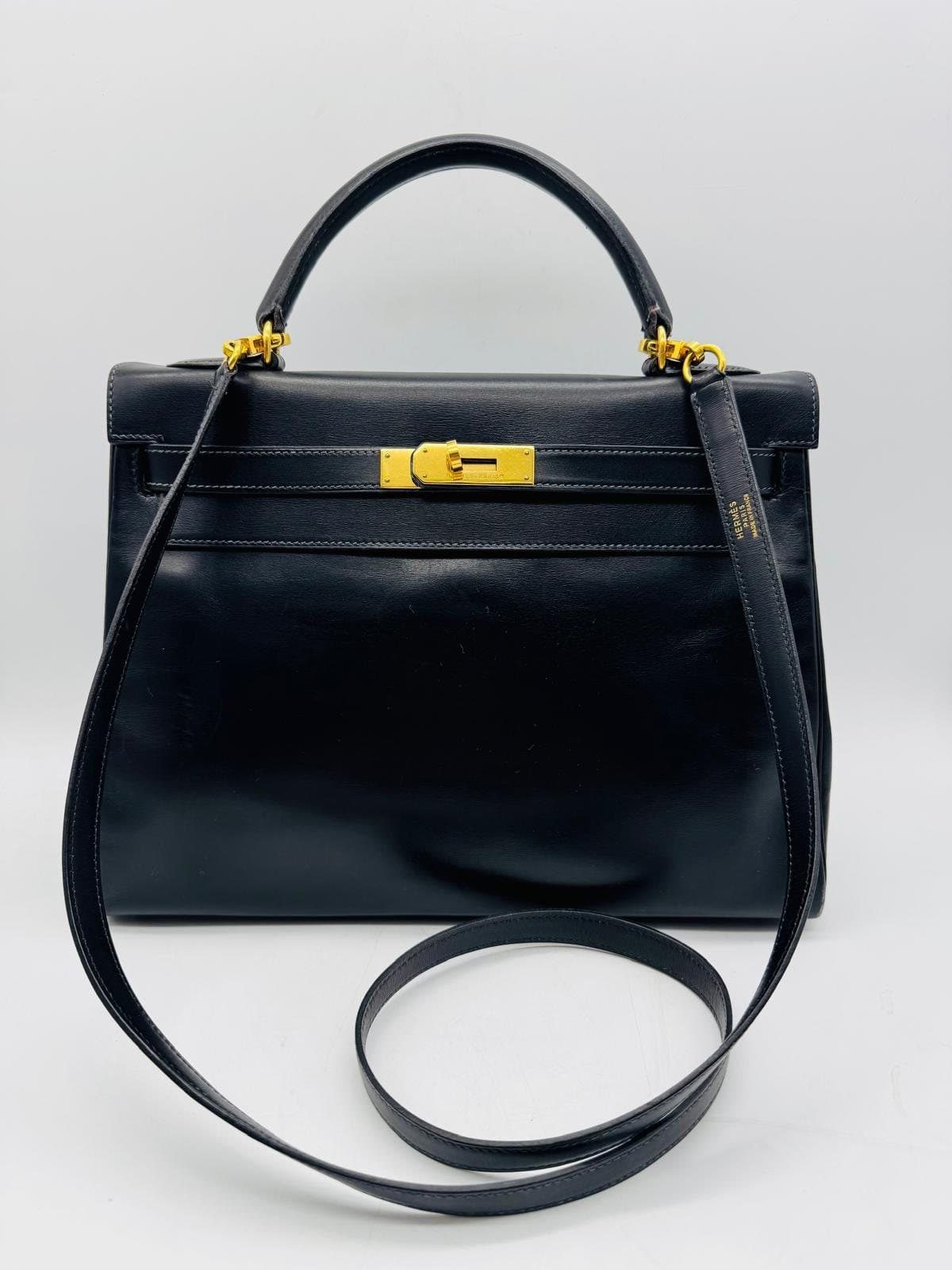 Schwarze Hermès Kelly Handtasche aus Leder